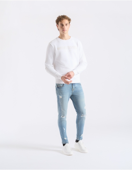 Jeans skinny fit con strappi